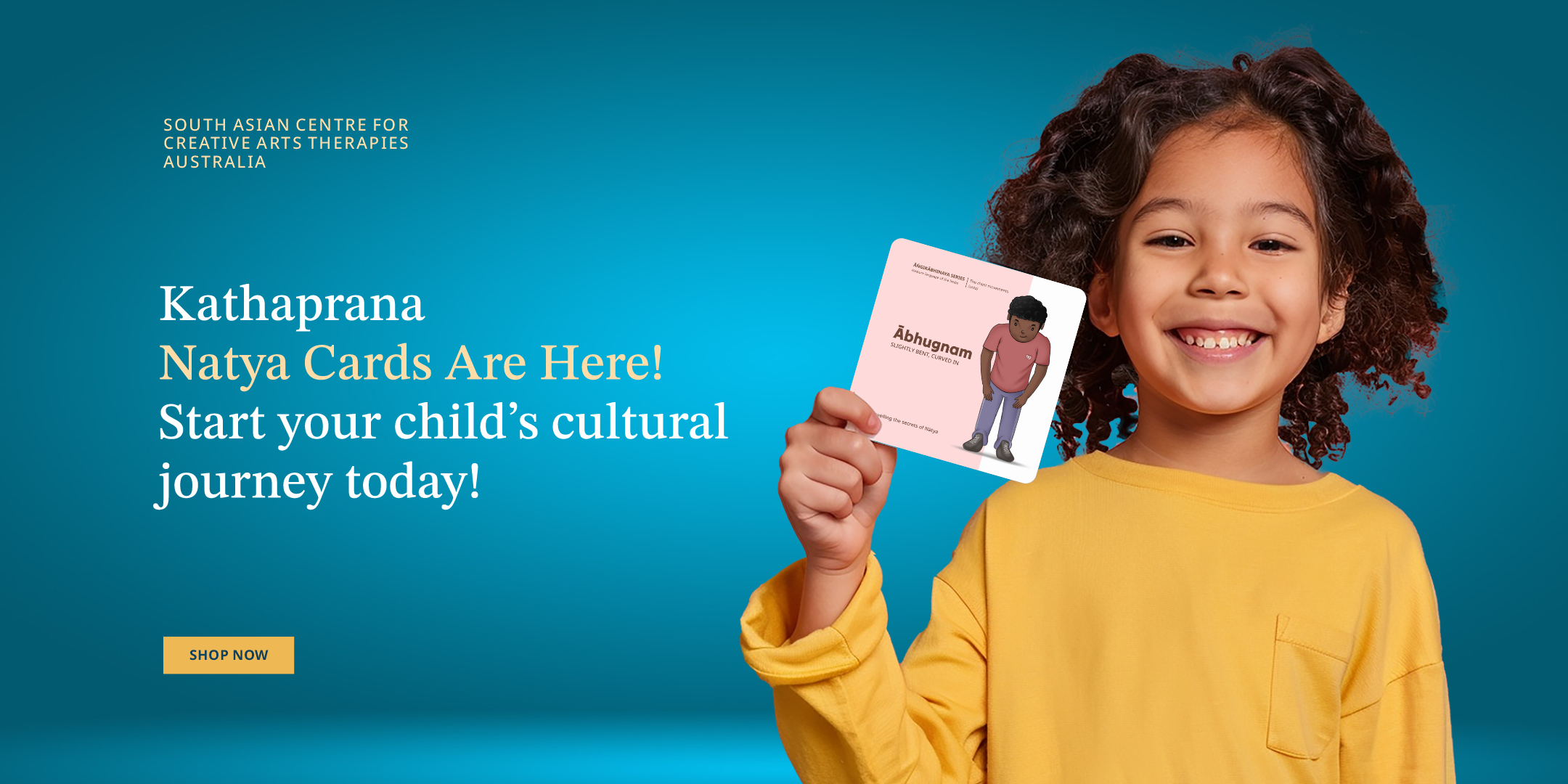 Smiling child holding Kathaprana Natya Card. An engaging way to introduce kids to Kathak dance and Indian cultural heritage. Shop Natya Cards by Kathaprana.