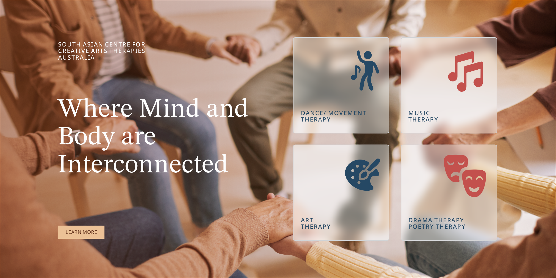 Group of people sitting in a circle while joining hands with each other. Kathaprana is a South Asian Creative Arts Therapy center in Melbourne.  Art-based therapy for individuals, couples and families – Book your session now.